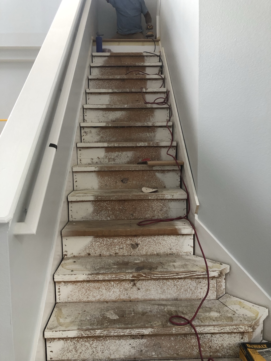 Staircase during removal and preparation of the previous finish